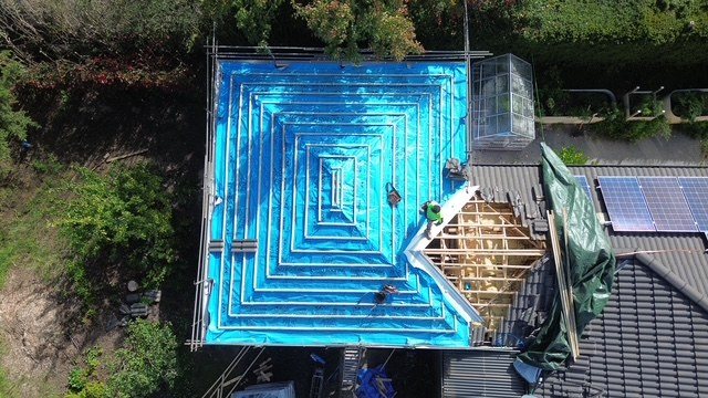 Before: new roof. From bare frame and sarking to a finished tiled roof.