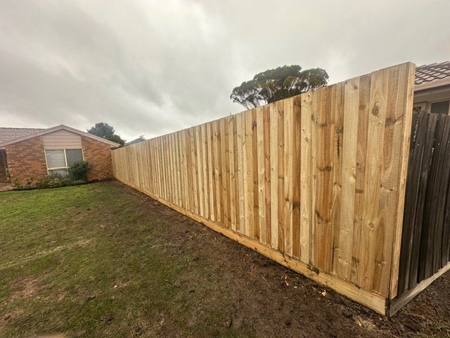 A new timber paling fence built by Barden Bros Group