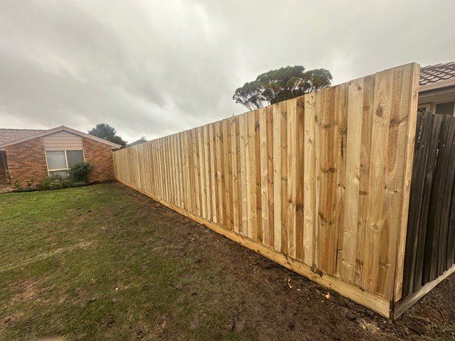 A new timber paling fence built by Barden Bros Group